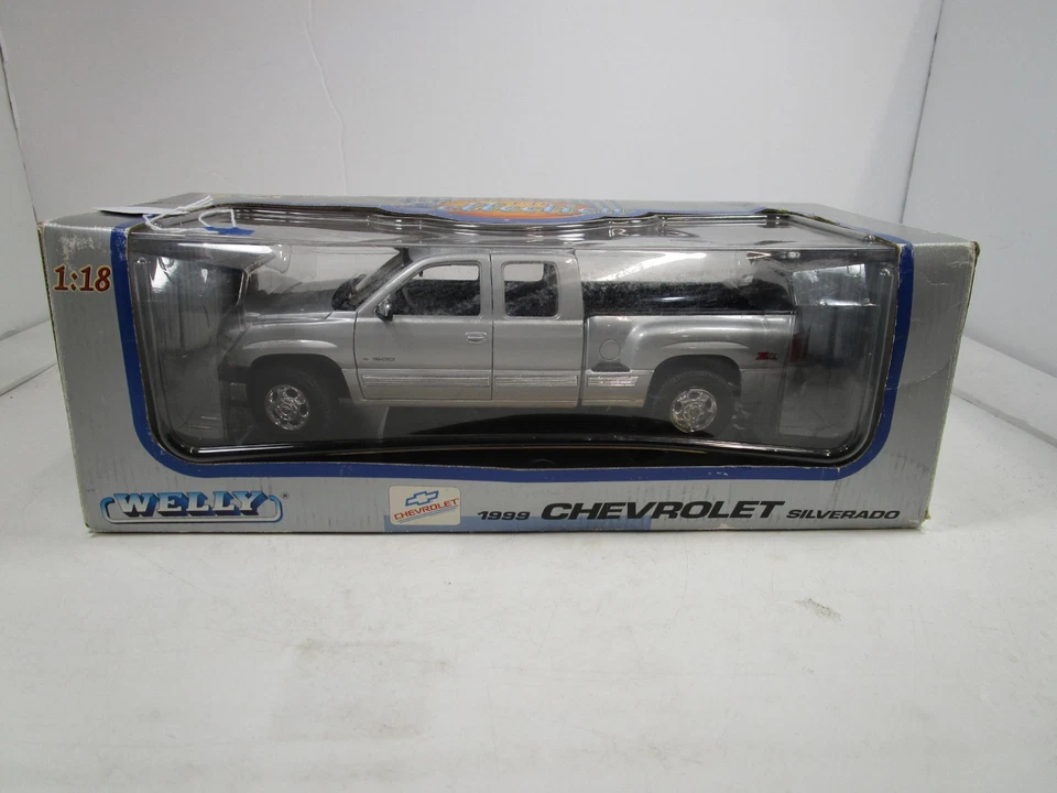 Chevy Silverado Z71 1999 WELLY 1/18 PLATEADO CABINA EXTENDIDA LADO DEPORTIVO USADO MUY BONITO Foto 1 de 4