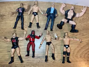 8 vintage WWE figures JAKKS Titan Tron, Triple H, Kane, The Rock etc - Picture 1 of 7