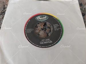 THE BEATLES 45 " Hey Jude / Revolution " CAPITOL Canada 1983' - Picture 1 of 2