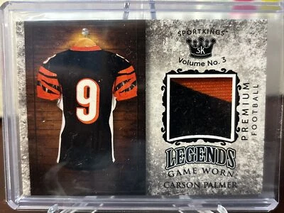2022 Sportkings Volume 3 Legends Game Worn Materials Black Carson Palmer #LSM-47 - Image 1 of 3