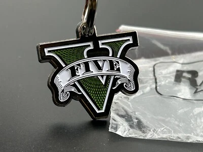 Grand Theft Auto V GTA V Logo Metal Rockstar Games AUTÉNTICO Llavero NUEVO Foto 1 de 3