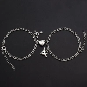 2X Bracciale Catenina a maglia cuore magnetici cuore chiavi ali innamorati amore - Foto 1 di 4