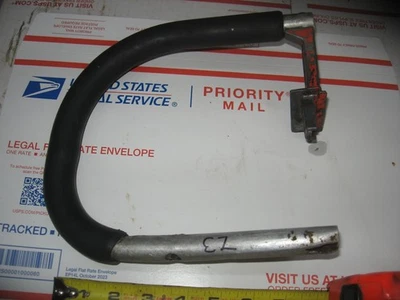 VINTAGE HOMELITE  CHAINSAW MODEL EZ HANDLE AND BRACKET - Image 1 of 3