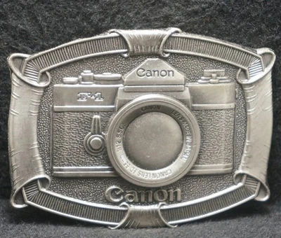 XC11159 VINTAGE AÑOS 70 ***CÁMARA CANON F-1*** FOTOGRAFÍA HEBILLA CINTURÓN PELTRE Foto 1 de 2