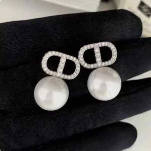 Wunderschöner AAAAA 10-11mm Südsee weiße runde Perlen Ohrring 925er - Bild 1 von 2