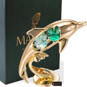 Adorno de estatuilla Matashi enchapada en oro 24K con tachuelas de delfín montando olas - Imagen 1 de 9