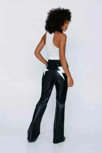 NASTY GAL Womens SIZE 14 Black Vegan Leather Flare PANTS Star Lightning NWT NEW - Picture 1 of 9