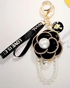 Anello Charming Strass Borsetta Borsa Auto Ciondolo Corda Perla Camelia - Foto 1 di 3