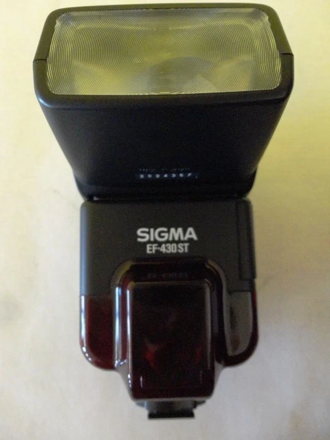 Flash de montaje en zapata Sigma para cámara fotográfica modelo EF-430ST EF430ST usado estado Foto 1 de 1