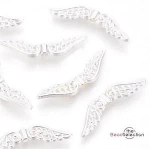 20 ciondoli ali d'angelo filigrana argento tibetano brillante 32 mm C207 - Foto 1 di 4