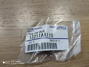 GENUINE NEW OEM SUBARU SEAL-EXH VALVE 13211AA110 - Picture 1 of 1