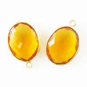Colgante de piedras preciosas bisel - óvalo facetado de 14x18 mm - cuarzo citrino (se vende por 2 piezas) - Imagen 1 de 2
