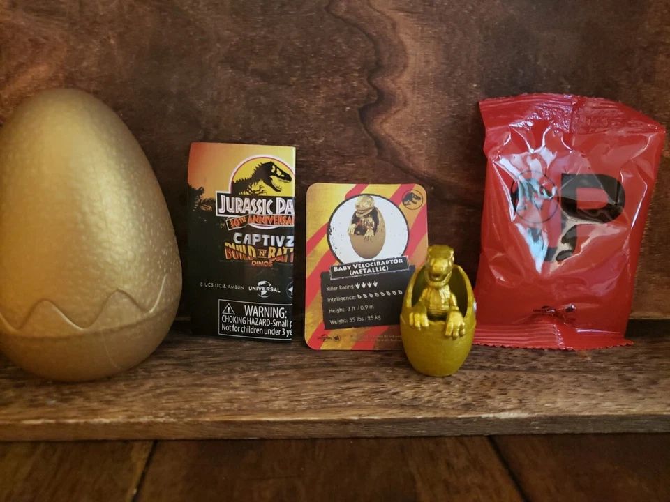 Парк Юрского периода 30-й Captivz Build N Battle Dinos Золотой Металлик Малыш Велоцираптор  - Изображение 1 из 2