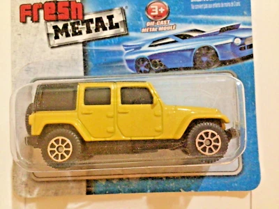 Maisto JEEP WRANGLER 无限制 - 黄色 1: 64 比例未使用;密封包装 — 第 1/4 张图片