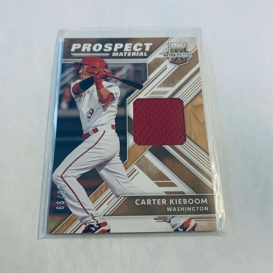 F91556  2018 Elite Extra Edition Prospect Materials Gold #19 Carter Kieboom/99 - Image 1 of 1