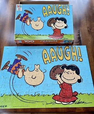 1976 Peanuts AAUGH! 100 Piece Puzzle 16” X 11” Charlie Brown and Lucy Football - Image 1 of 4