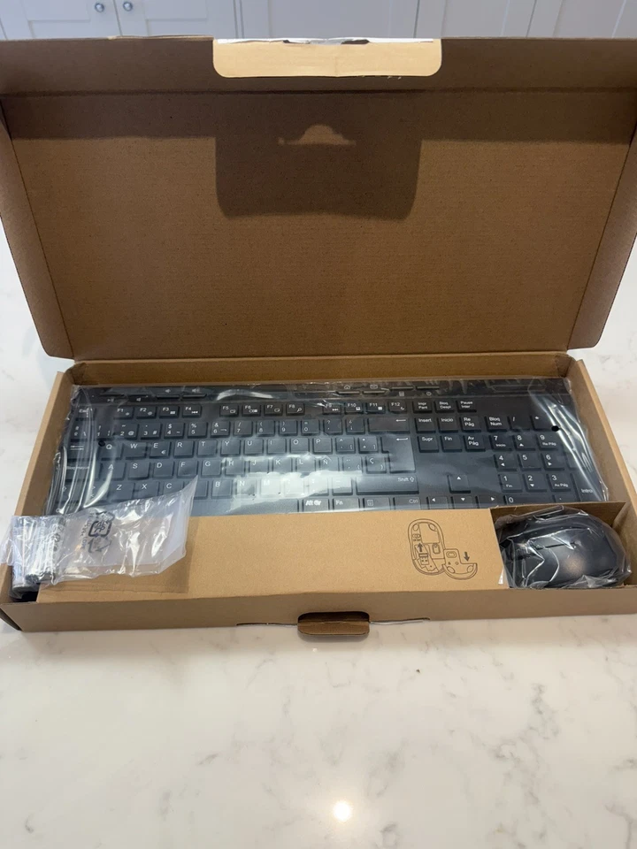 Amazon Basics  Wireless Keyboard and Mouse Combo Full-Sized, 2.4GHz USB receiver - Image 1 of 4