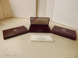 Monedas olímpicas como nuevas de Estados Unidos con certificado de autenticidad, caja vacía sin monedas - Imagen 1 de 8