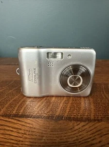 Nikon Coolpix L3 5.1MP Digital Camera Silver Handheld - Battery Door Issue - Picture 1 of 8