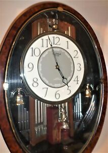 GENUINE RHYTHM 4MH750 MELODIES IN MOTION MUSICAL ANIMATED ORGANIST WALL CLOCK!