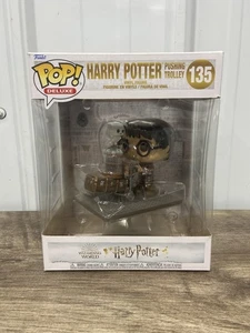 Funko Pop! Deluxe: Harry Potter - Harry Potter Pushing Trolley #135 - Picture 1 of 6