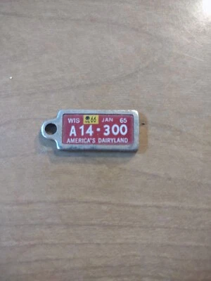 1965 Wisconsin Disabled American Veteran License Plate Keychain Tag - Image 1 of 2
