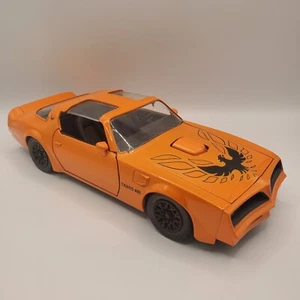 Jada Bigtime Muscle 1:24 1977 Pontiac Firebird (orange) - Bild 1 von 8