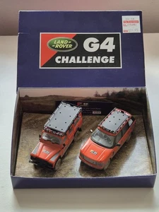 1:43 - Corgi Vanguards - G4 Challenge - Land Rover Defender Range Rover - Nuovo con scatola - Foto 1 di 19