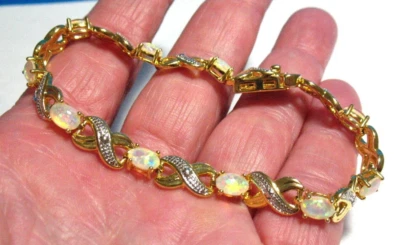 PULSERA TENIS ÓPALO DORADO 7 PULGADAS DE LARGO Foto 1 de 2