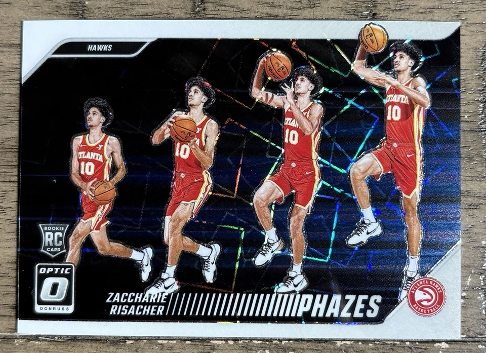 Estuche Donruss Optic Zaccharie Risacher RC 2024-25 Phazes Prizm SSP Hit Hawks Foto 1 de 1