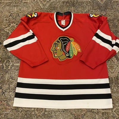Camiseta deportiva vintage de los Chicago Blackhawks para hombre XL roja años 90 CCM máscara NHL deporte en blanco EE. UU. Foto 1 de 4