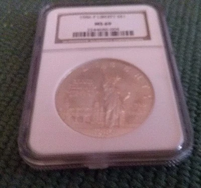 1986 P  LIBERTY Commemorative Silver Dollar NGC  MS-69 - Image 1 of 2