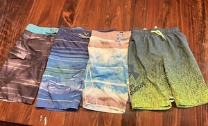 Boys swim trunks (lot of 4) Size 10/12, Zeroxposur & Under Armour - Picture 1 of 5