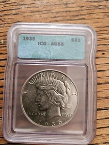 1935 P US Peace Silver Dollar, ICG - AU55 - Picture 1 of 2