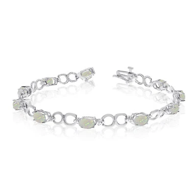 Brazalete de diamantes y ópalo ovalado de oro blanco de 10K Foto 1 de 3
