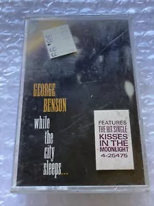 FACTORY SEALED CASSETTE - GEORGE BENSON - WHILE THE CITY SLEEPS - Picture 1 of 2