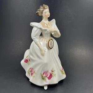 Figura del mes vintage Royal Doulton dama HN2708 ABRIL Peggy Davies 1988 - Imagen 1 de 9