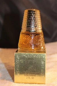 AVON DECANTER GOLDEN THIMBLE BIRD OF PARADISE COLOGNE 2 OUNCE FILLED W/ BOX - Picture 1 of 3