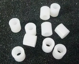 Custom Bespoke white acetal nylon bushes for a Ford Sierra manual steering rack - Picture 1 of 12