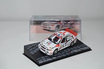 B24 1:43 ALTAYA IXO MITSUBISHI LANCE RS EVO III RALLY SAN MARINO 1996 MIB 2 - Immagine 1 di 4