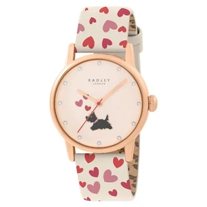 NUOVO OROLOGIO DA DONNA RADLEY CASSA TONO ORO, QUADRANTE ORO, CINTURINO CREMA CON CUORI ROSA - Foto 1 di 4