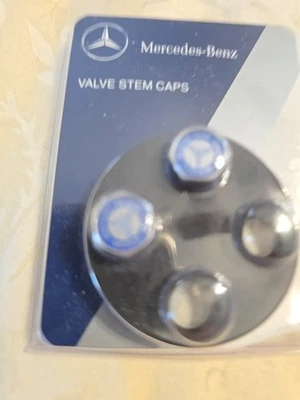 Juego de tapas de vástago de válvula de neumático genuino Mercedes-Benz, tapas plateadas azul laurel NUEVO - 2 piezas Foto 1 de 3
