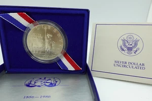 1986 P Ellis Island US Liberty Dollar Silver Uncirculated Coin w/ COA & Box - Picture 1 of 4