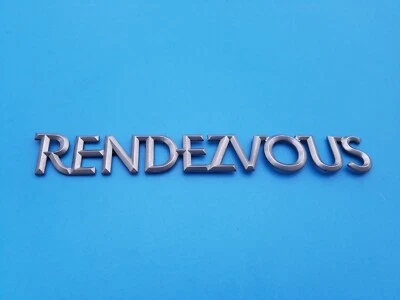 02 03 04 05 06 BUICK RENDEZVOUS EMBLEMA TRASERO PLATEADO LOGOTIPO INSIGNIA SÍMBOLO OEM (2003) Foto 1 de 3