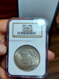 1924-P Silver Peace Dollar NGC MS 64 (Copper/Gold Toning Obverse) - Picture 1 of 5