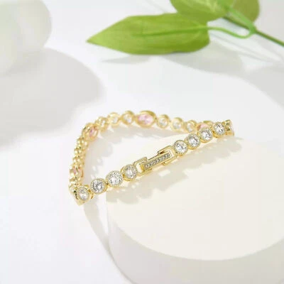 Brazalete de tenis enchapado en oro amarillo de 14 k con bisel creado de 14 quilates con zafiro y diamantes Foto 1 de 4