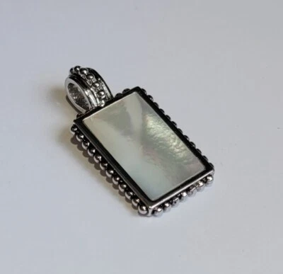 Retired Lia Sophia Mother Of Pearl Reversible Silver Scroll Slide Pendant - Image 1 of 4