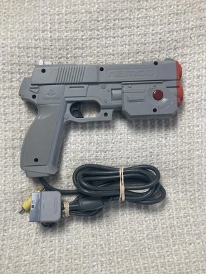 Pistola de luz Sony PlayStation 1 PS1 Namco Guncon NPC-103 gris Foto 1 de 4