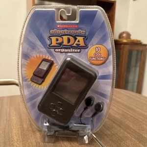 Scholastic, Organisateur Pda électronique année 2000 - Photo 1 sur 2