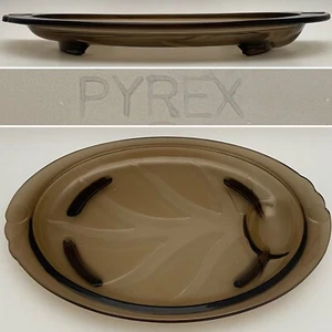 Plato para servir carne ovalada a humo Pyrex Tree of Life 815 c1980s EE. UU. 15"x10" - Imagen 1 de 9